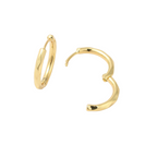 Gold hoop earrings on a white background