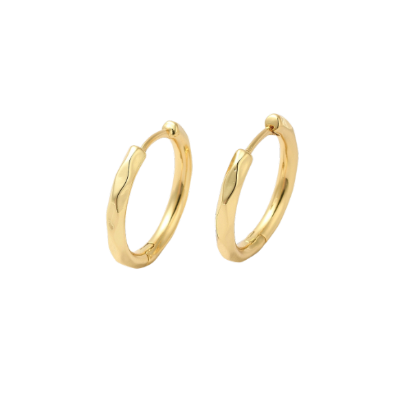 Gold hoop earrings on a white background