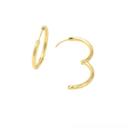 Gold hoop earrings on a white background
