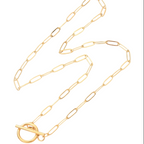Gold chain necklace on a white background
