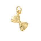 Gold bow-shaped pendant on a white background
